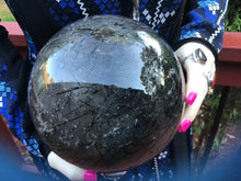 Load image into Gallery viewer, SOLD OUT ~ Reserved for Angela ~ Payment 8 of 20 ~ Large Clear Quartz Tourmaline Crystal Ball ~ 6&quot; Wide ~ 14 Lb. 5 oz ~ Thick Black Hairs